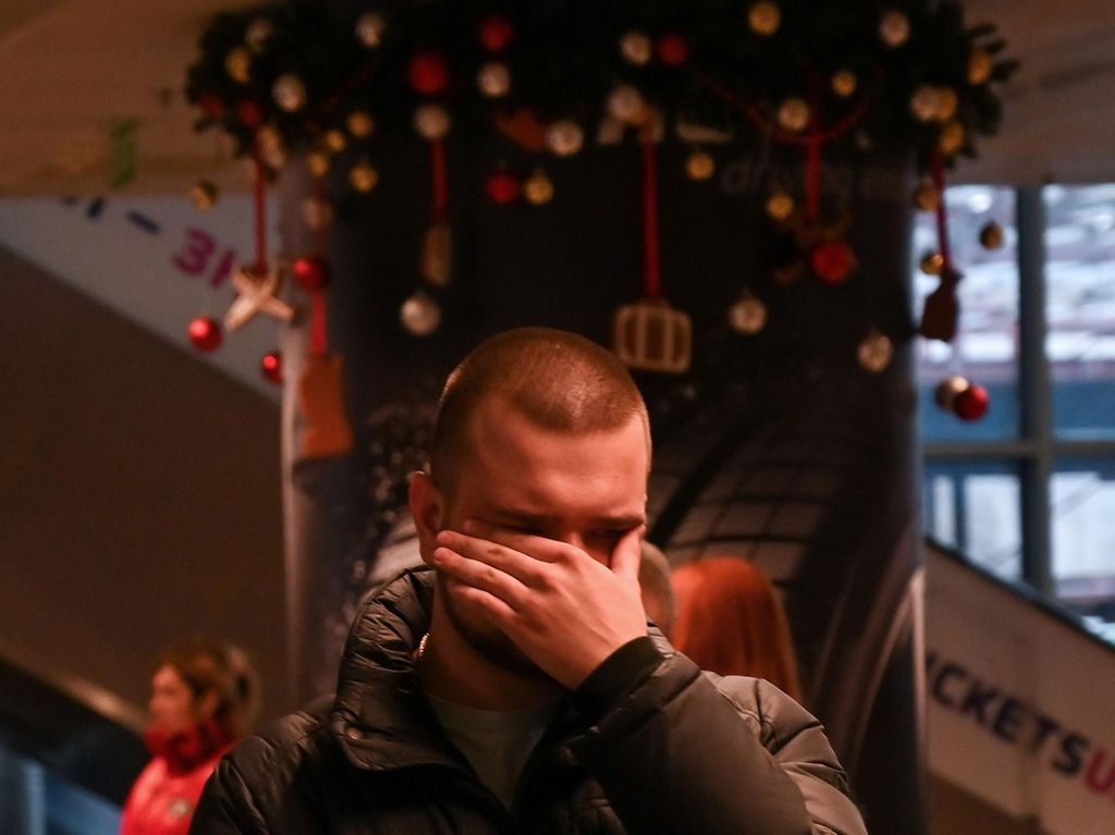 A relative of one of the victims on the crashed Ukraine International Airlines Flight PS752 reacts at the Boryspil airport outside Kiev on January 8, 2020. AFP