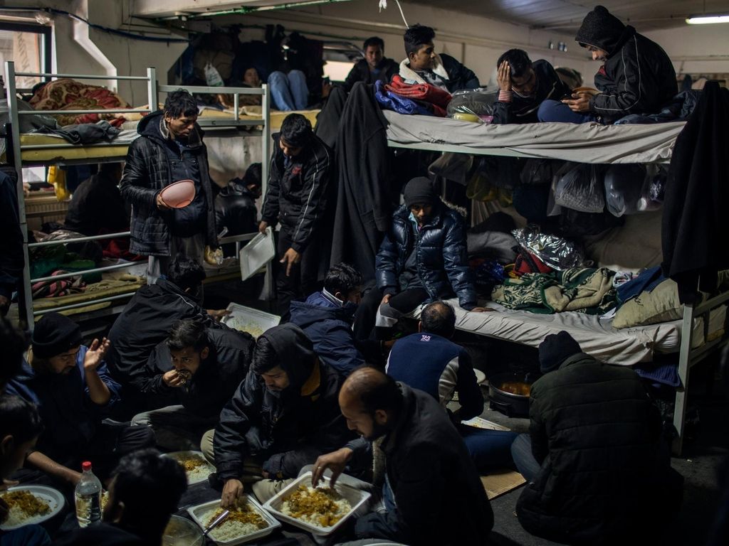 Migrants mostly from Bangladesh are living in an overcrowded room in the Miral camp in Velika Kladusa. JM Lopez / The National