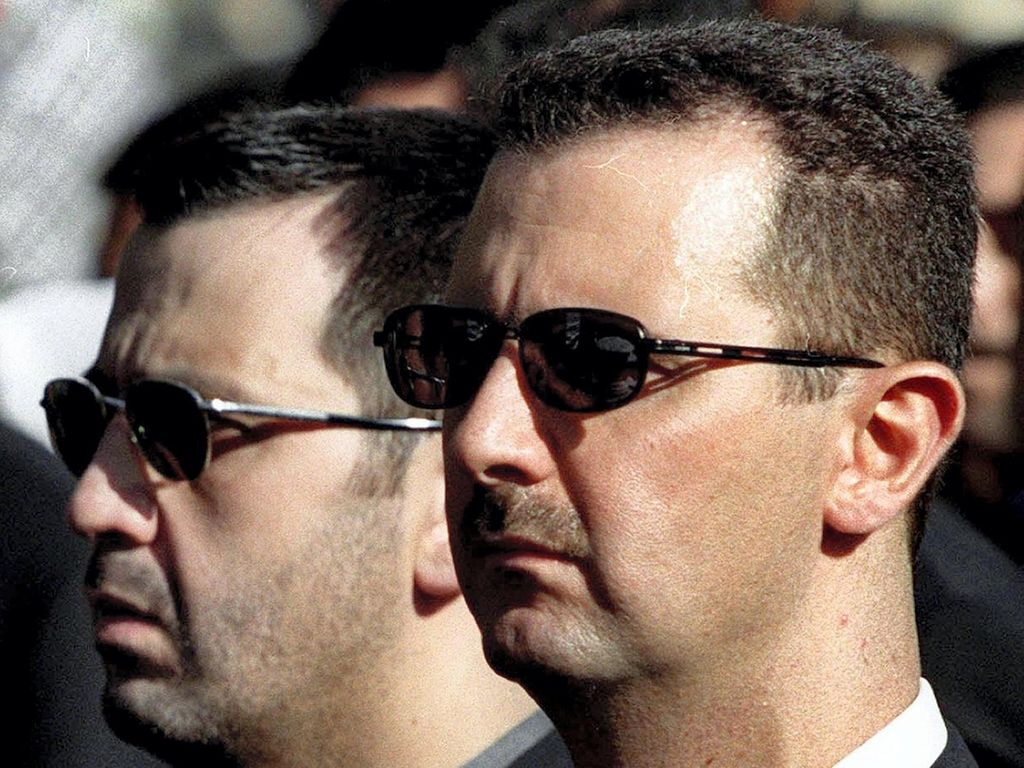 Bashar al-Assad and his brother Maher at their father's funeral in Damascus on June 13, 2000. AFP 