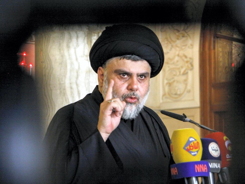 Moqtada Al Sadr delivers a speech to his supporters. AFP