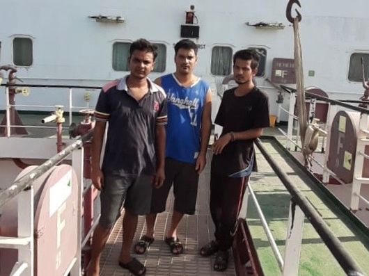 Seafarers onboard the Mt Iba anchored off the Dubai coast hope lifting of Covid-19 maritime restrictions will allow them to return home after three years at sea. From left, cook Monchand Shaikh, second engineer Vinay Kumar and ordinary seaman Nirmal Singh, all from India. Courtesy: Nay Win 