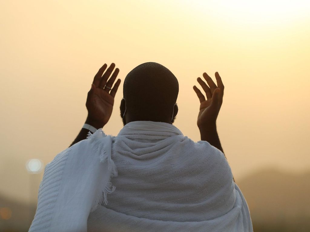 A Muslim pilgrim praying on Mount Arafat, also known as Jabal Al Rahma (Mount of Mercy), southeast of the holy city of Makkah during the climax of the Hajj pilgrimage amid the Covid-19 pandemic. AFP