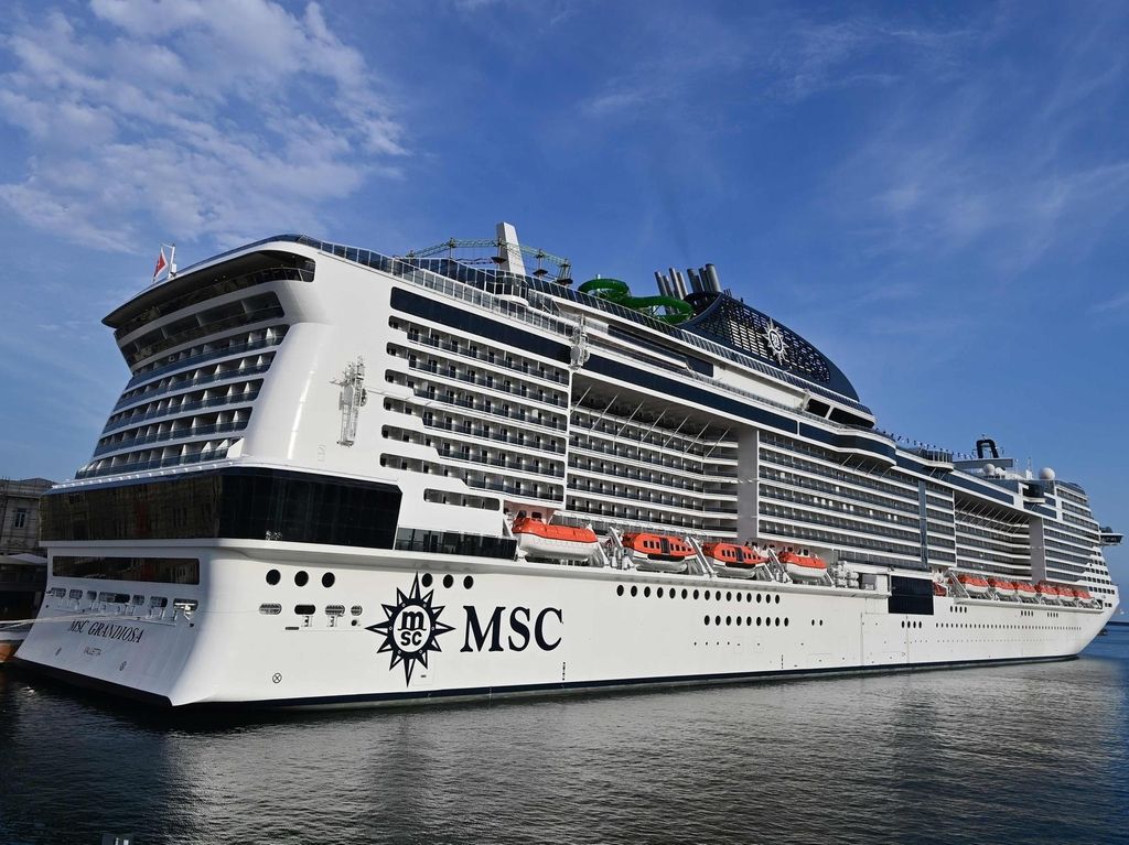 The MSC Grandiosa left Italy for Malta as the first major cruise ship to set sail in the Mediterranean in more than five months. AFP