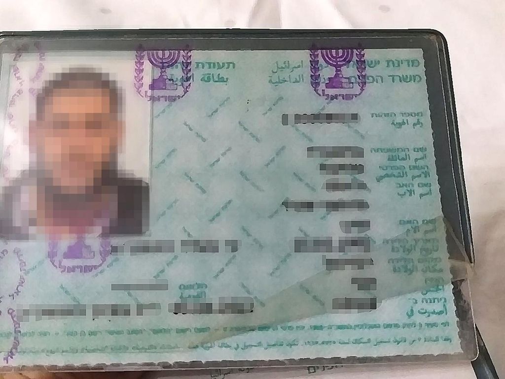 The Israeli identification document of Mohammed Khalid, provided by his family. The National