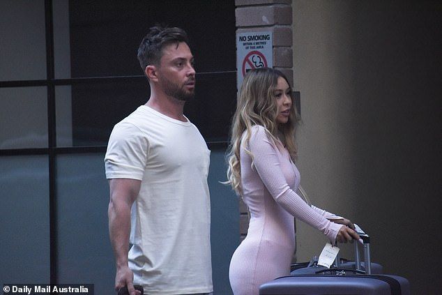 And action! Jason was spotted filming scenes with his as-yet-unidentified bride (right) outside an apartment complex in Sydney's business district on Thursday, October 1st
