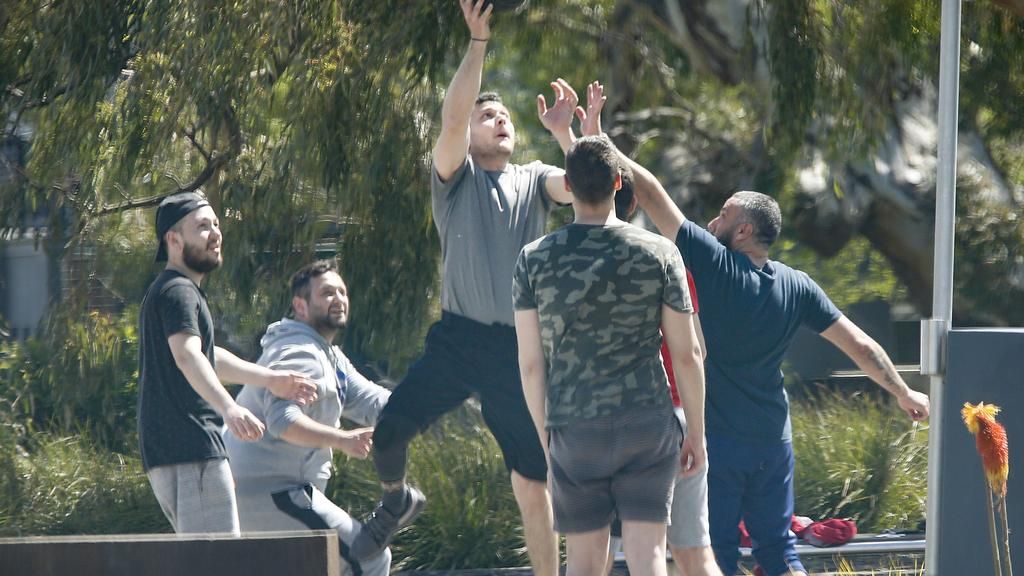 A group of maskless men were seen playing basketball in Epping. Image: David Caird