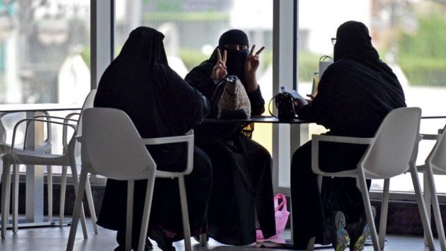 Three women at a shopping center in the Saudi capital, Riyadh, in June 2020