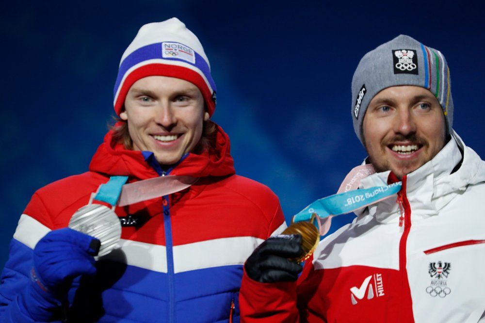 Click on the image to enlarge. Olympics 2018: Henrik Kristoffersen with the silver medal and Marcel Hirscher from Austria with a gold medal for giant slalom at Pyeongchang Medals Plaza in Pyeongchang during the Olympics in 2018.