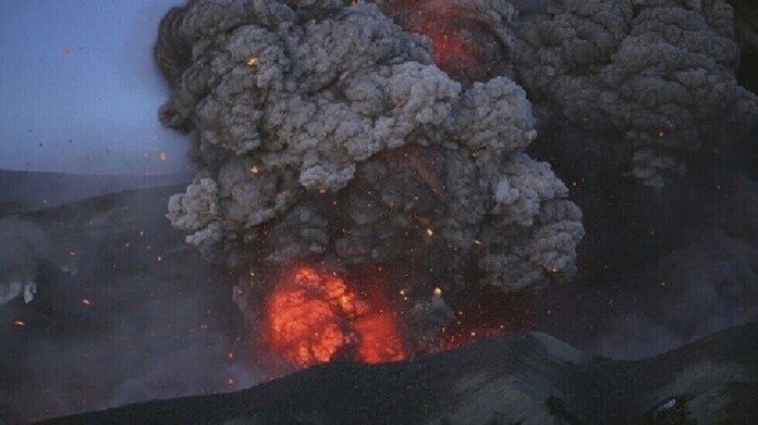 Why do volcanoes erupt violently after decades of inactivity?