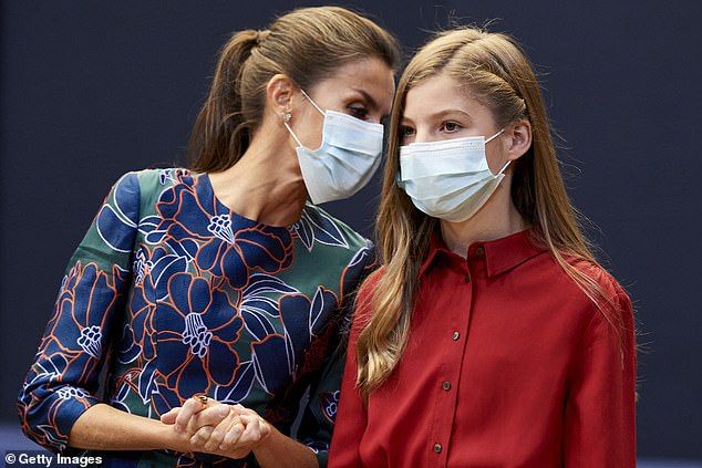 Letizia (pictured with Sofia), 48, looked as sleek as ever, donning a recycled green and blue floral dress that was considered a custom Caroline Herrera