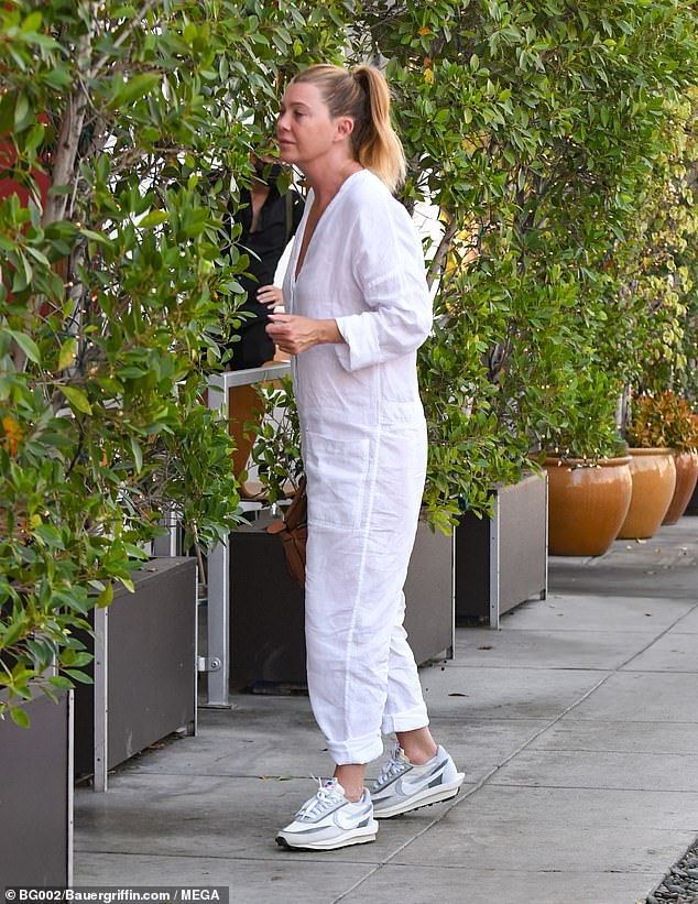 Sporty: She wore the linen overall with button fastening and V-neckline and combined it with white sneakers