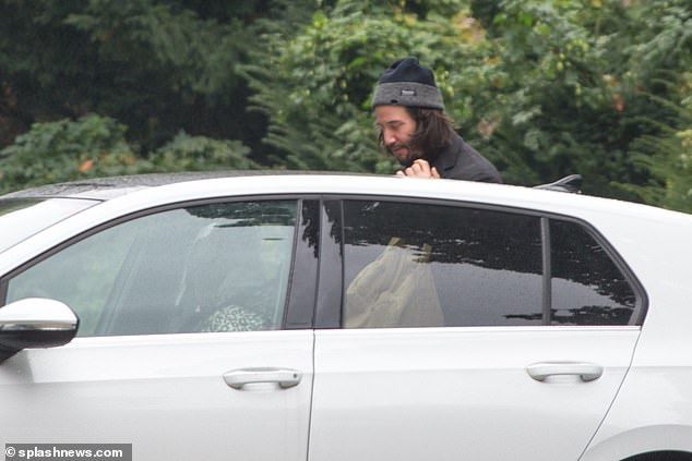 Discussion: As Keanu got out of the car, he was seen chatting with Alexandra at the window