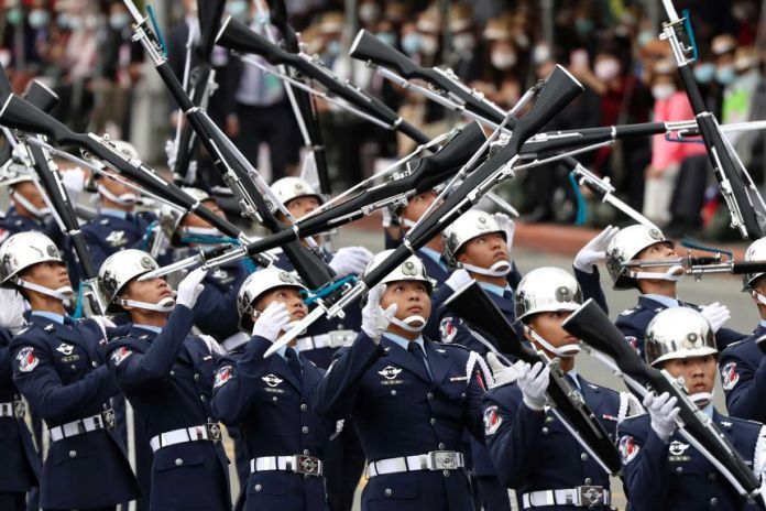 The Military Honor Guard perform during the National Day celebrations in Taipei.