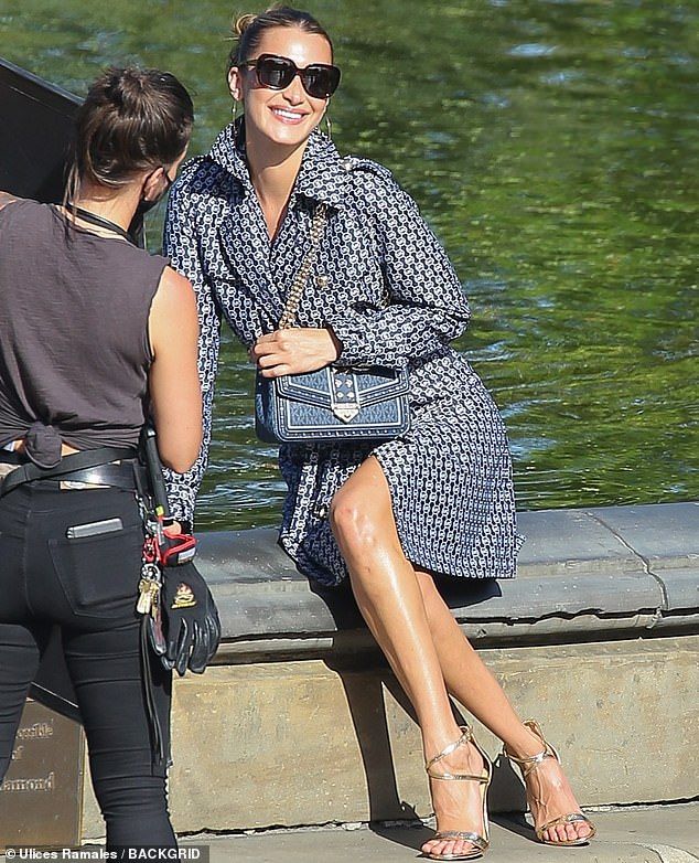 When you got it: The 24-year-old supermodel showed off her sculpted legs as she flashed her megawatt smile while sitting in front of the water