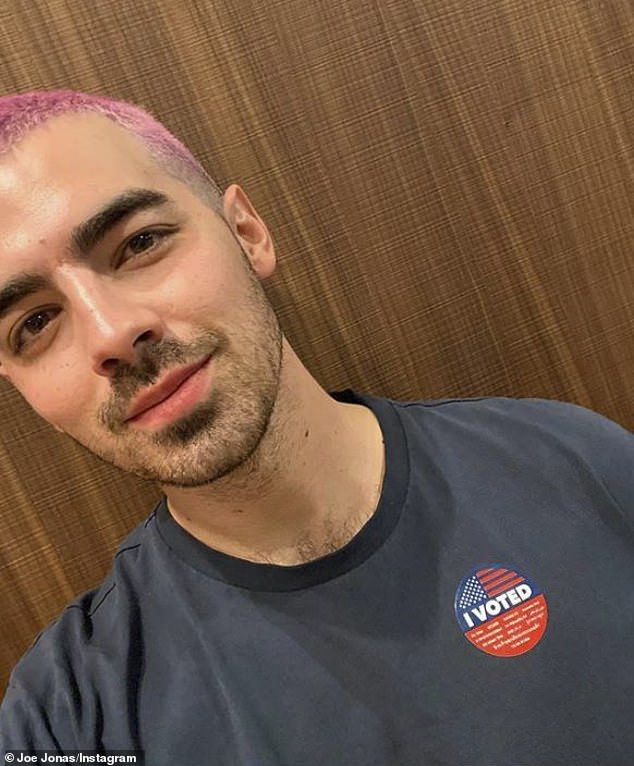 Heard his voice: Joe also shared a photo after early voting on October 4th