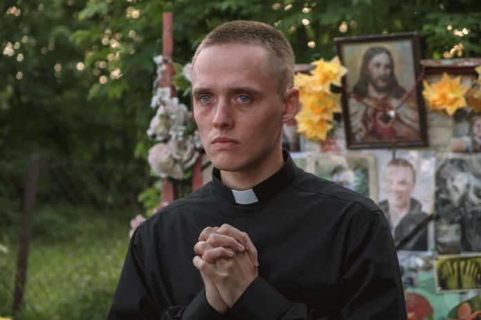 A scene from the film Corpus Christi with a young man in priestly clothing