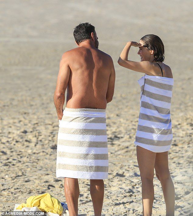 Twinning: Rose and Bobby wrapped themselves in matching white and beige striped towels