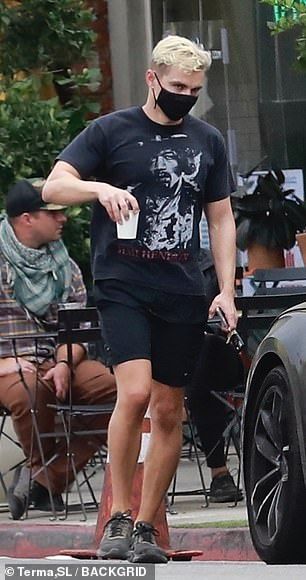 Casual: Franco got out on Saturday in black shorts and a Jimi Hendrix T-shirt