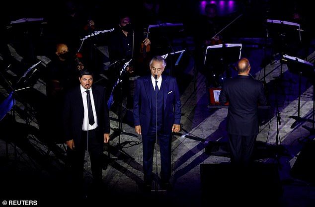 Suave: Andrea changed clothes once during the performance and put on a navy blazer that goes with his suit