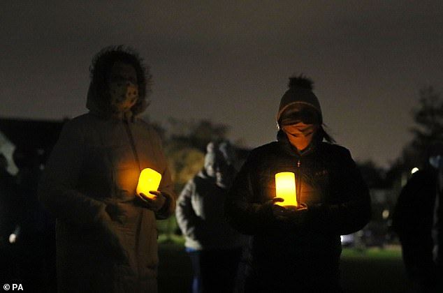 People at a candlelight vigil at the Llewellyn estate in Ballinteer, south Dublin