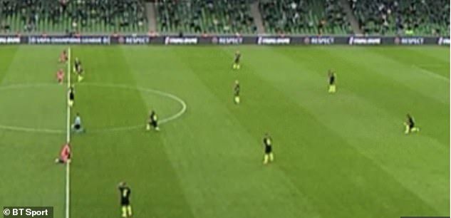 BT Sport coverage briefly showed the scene when seven Krasnodar players failed to get on their knees