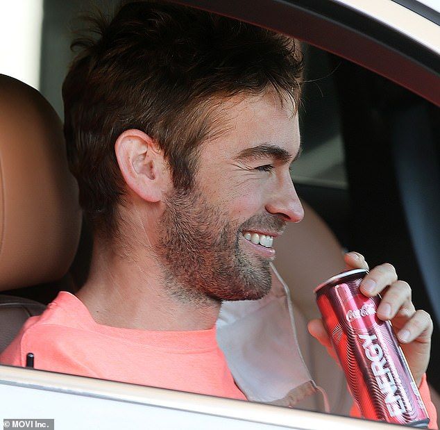 Sizzling Feeling: The 35-year-old Beefcake showed off his dazzling smile as a movie star and his rugged five o'clock shadow as he sat in his car