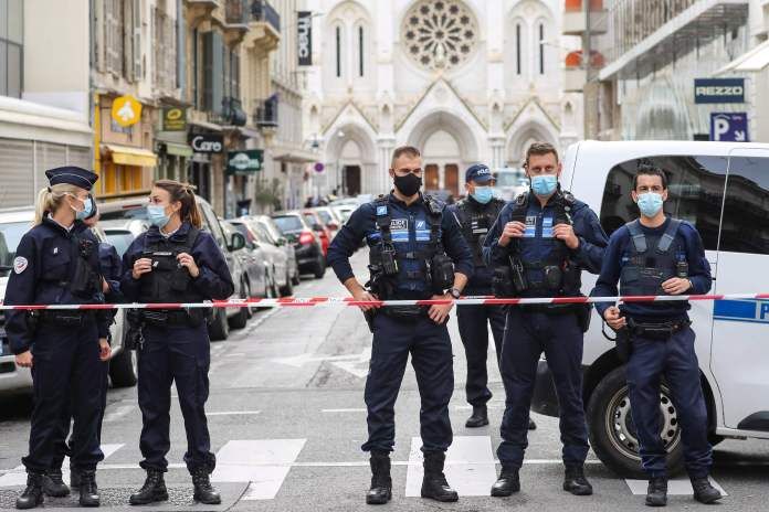 Police in front of the church after the attack