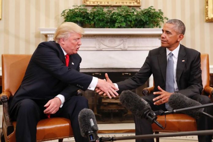 President Barack Obama and President-elect Donald Trump shake hands.