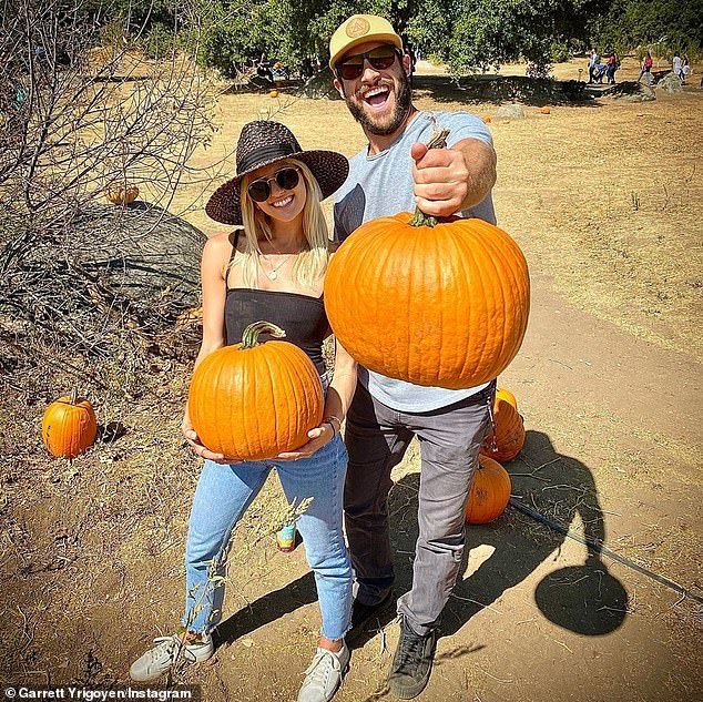 Pumpkin patch: Garrett also posted pictures of himself with Alex on a pumpkin patch on Saturday.