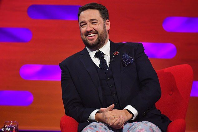Dapper: Comedian Jason Manford chatted with Graham on the late night show but seemed to have forgotten his suit pants in favor of some pajama bottoms