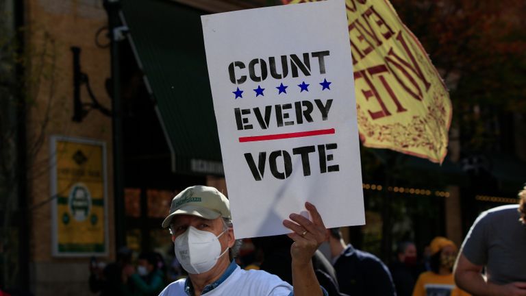 Protesters outside the Pennsylvania Convention Center protest in Philadelphia, Pennsylvania on November 5, 2020 - Pennsylvania continues to count the votes in the November 3 election. (Photo by Kena Betancur / AFP) (Photo by KENA BETANCUR / AFP via Getty Images)