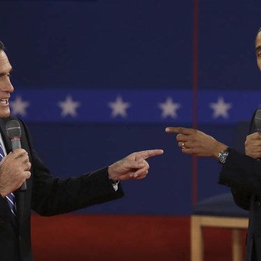Mitt Romney and President Barack Obama save during the second presidential debate in October 2012.