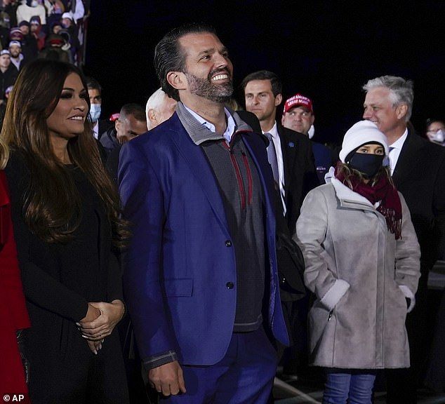 Donald Trump Jr. and girlfriend Kimberly Guilfoyle at President Trump's final election rally in Grand Rapids, Michigan