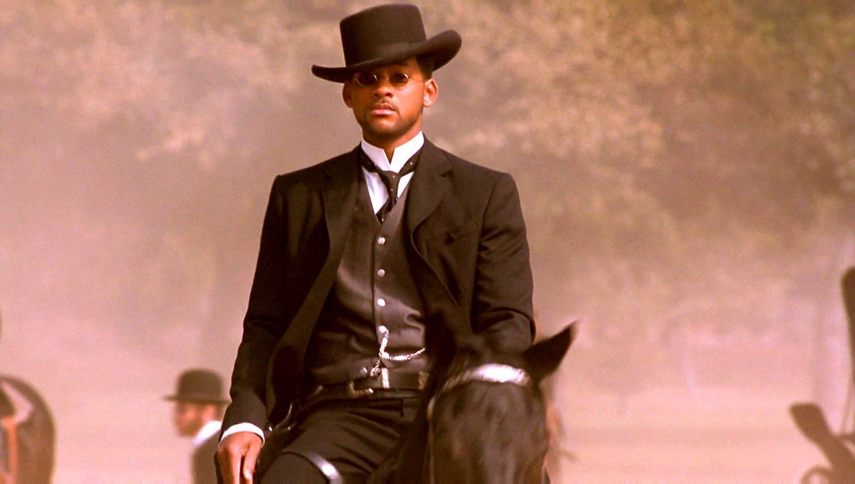 Will Smith rides a horse as a cowboy