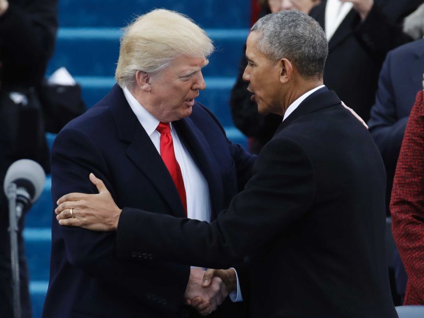 Donald Trump shakes hands with President Barack Obama ahead of the President's 58th inauguration