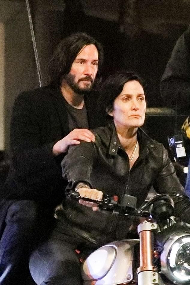 Attendees at the Matrix 4 celebration reportedly included Keanu Reeves and his girlfriend Alexandra Grant, as well as the movie's creators, Lana and Lilly Wachowski. Pictured above, Keanu Reeves and Carrie-Anne Moss in The Matrix 4