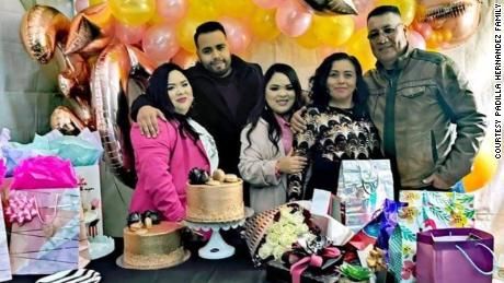 Sergio with his twin sisters and parents with the sisters & # 39; 30th birthday.