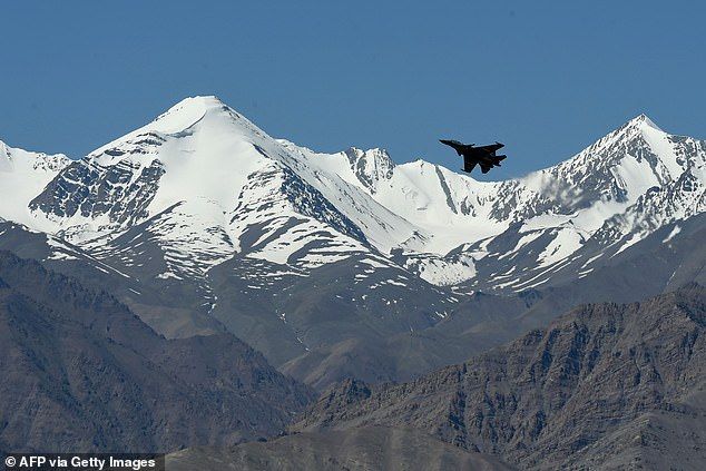 Indian fighter jet flies over mountains near border with China earlier this year