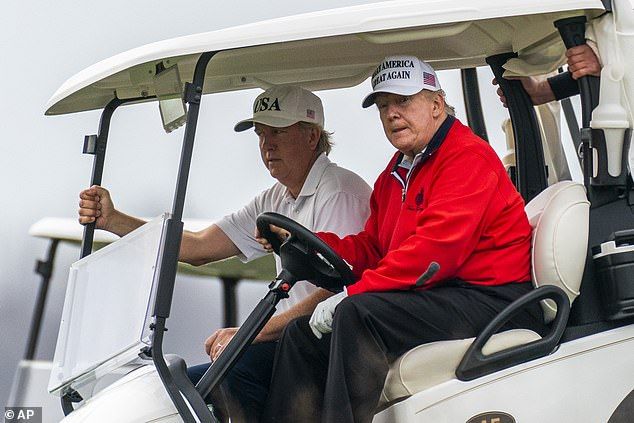 Since Biden was declared the winner two weeks ago, Trump (pictured at his golf course in Virginia on Saturday) has launched a barrage of lawsuits and mounted a lobbying campaign to prevent states from certifying their total votes