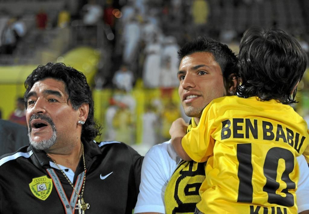 Maradona, with Agüero and his grandson Benjamin.