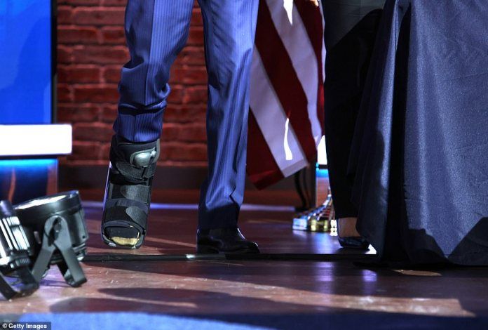 Kick off on stage: Biden's surgical boot is expected to be a feature of life for several weeks, though it's unclear if he'll still be there for his inauguration