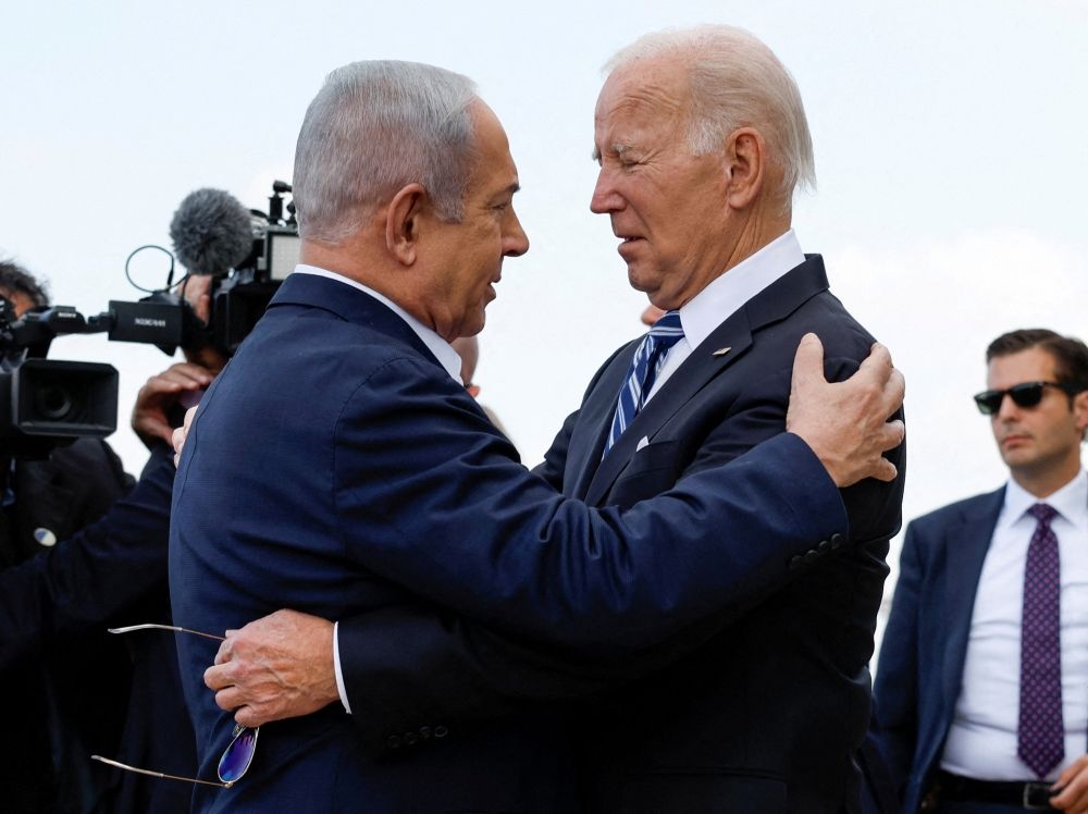 In half a century of public life, US President Joe Biden has demonstrated unwavering support for Israel. In this photo Biden is welcomed by Israeli Prime Minster Benjamin Netanyahu, as he visits Israel amid the ongoing conflict between Israel and Hamas, in Tel Aviv, Israel, October 18, 2023. — Reuters pic