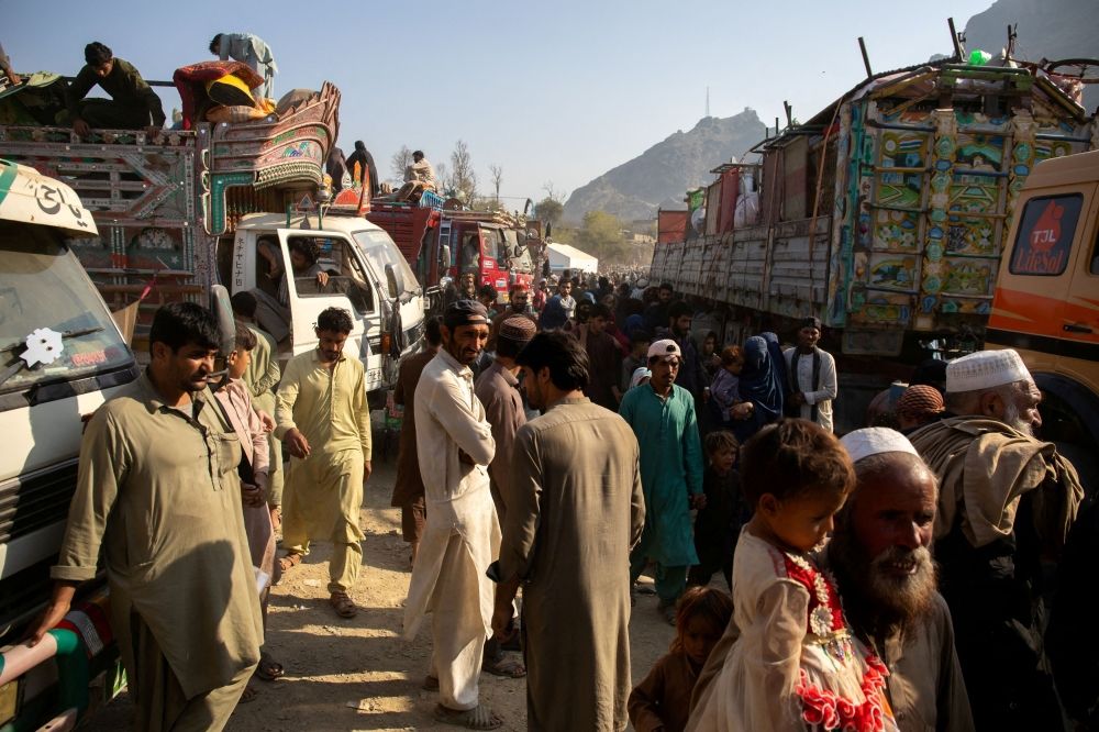 Afghan nationals are pictured as they head back to Afghanistan, at the Torkham border crossing between Pakistan and Afghanistan, October 30, 2023. — The Norwegian Refugee Council handout pic via Reuters
