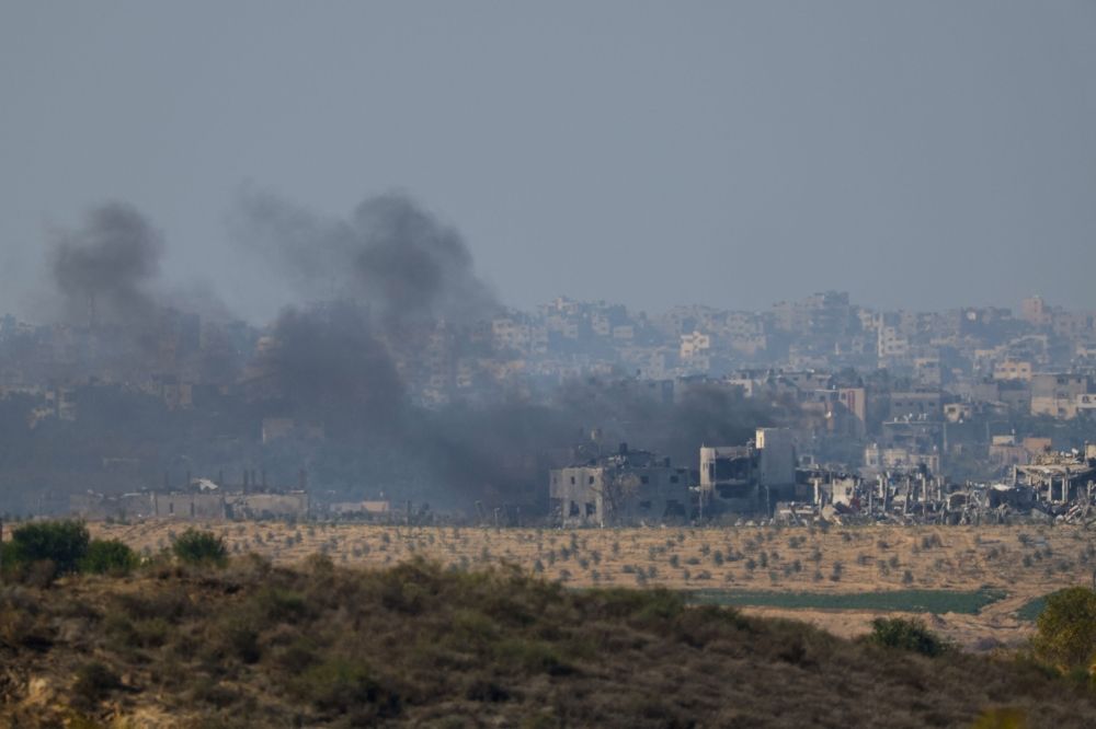 Smoke rises in Gaza following an Israeli strike, after a temporary truce between Israel and the Palestinian Islamist group Hamas expired, as seen from southern Israel, December 1, 2023. — Reuters pic