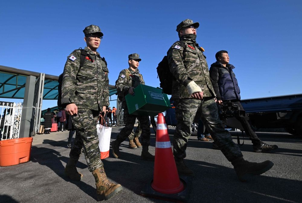 South Korean marines disembark from a passenger ferry at Yeonpyeong island, near the ‘northern limit line’ sea boundary with North Korea, on January 6, 2024, a day after North Korea's shelling. North Korea fired an artillery barrage near two South Korean border islands on January 5, Seoul's defence ministry said, prompting a live-fire drill by the South’s military. ― AFP pic
