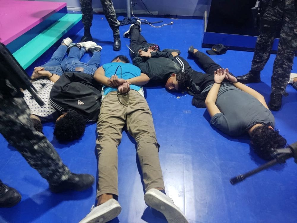 People accused of invading and taking over television station TC with weapons and forcing staff to lie and sit down, lie handcuffed on the floor in a police haundout, in Guayaquil, Ecuador, January 9, 2024. — Picture courtesy of Ecuadorean Police/Handout via Reuters