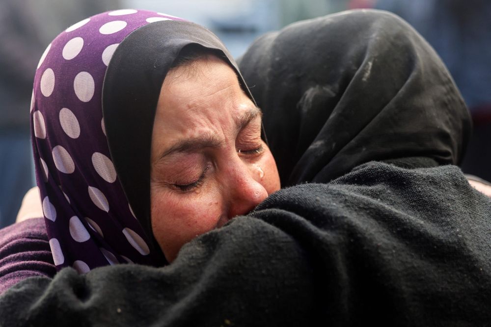 Women react upon identifying the body of a relative killed in Israeli bombardment at the Najjar hospital in Rafah in the southern Gaza Strip on February 3, 2024, as fighting continues between Israel and the Palestinian Hamas group. — AFP pic