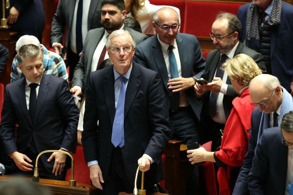 Barnier ousted as French PM after no-confidence motion unites far-right, left-wing lawmakers, plunging country into political chaos French Prime Minister Michel Barnier reacts after the result of the no-confidence vote on his administration at the National Assembly in Paris on December 4, 2024 as French MPs voted to oust his government after just three months in office in a move which deepens a political crisis in the country. — AFP pic