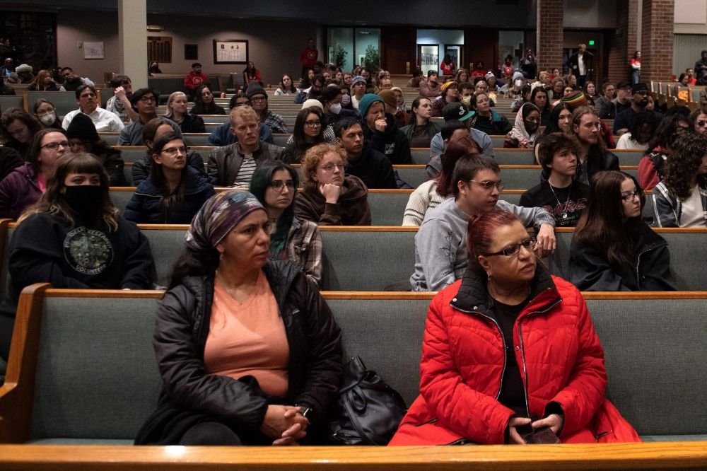 Participants listen to a speaker during an immigrants? rights gathering at the Shorter Community AME Church in Denver, Colorado February 17, 2025. — AFP pic