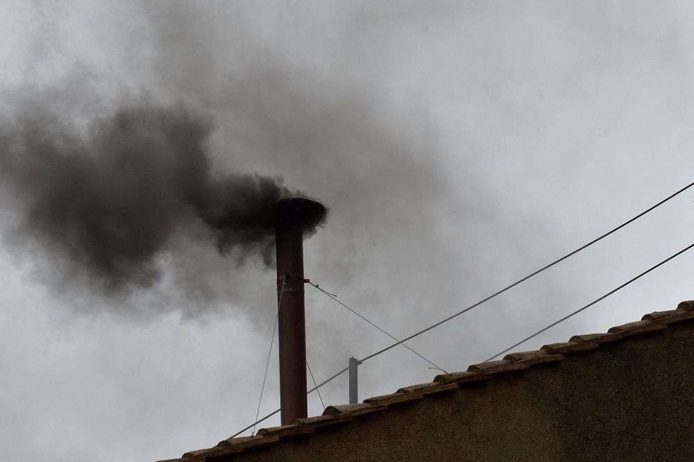 Black smoke rises from the chimney on the roof of the Sistine Chapel meaning that cardinals failed to elect a new pope in the second ballot of their secret conclave on March 13, 2013 at the Vatican. Pope Francis died on April 21, 2025 aged 88, a day after making a much hoped-for appearance at Saint Peter's Square on Easter Sunday, the Vatican said in a statement. — AFP pic
